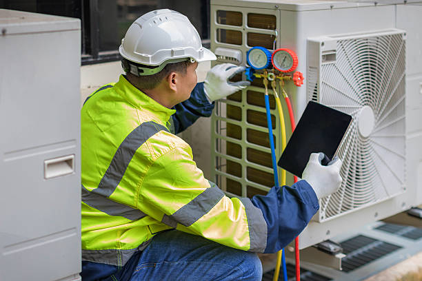 Professional Hvac technician working in Newell, WV